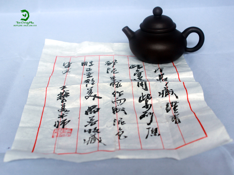 mộc bản viết tay trong ấm tử sa